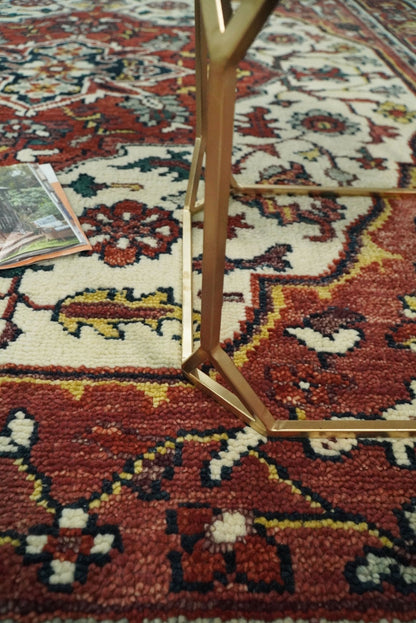 Rust And Ivory Traditional Medallion Hand Knotted Wool Area Rug.