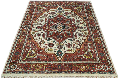 Rust And Ivory Traditional Medallion Hand Knotted Wool Area Rug.