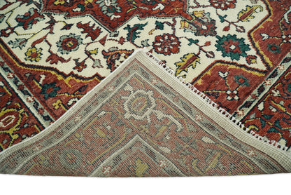 Rust And Ivory Traditional Medallion Hand Knotted Wool Area Rug.