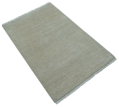 Hand Knotted Beige Modern Solid Design Wool And Silk Rug.