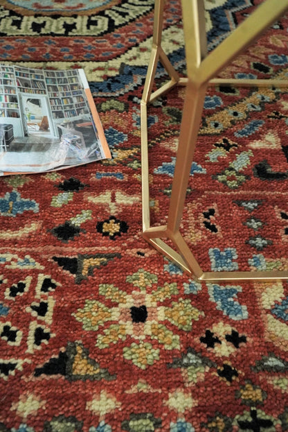 Hand Knotted Traditional Kazak Medallion Rust and Black Wool Area Rug.