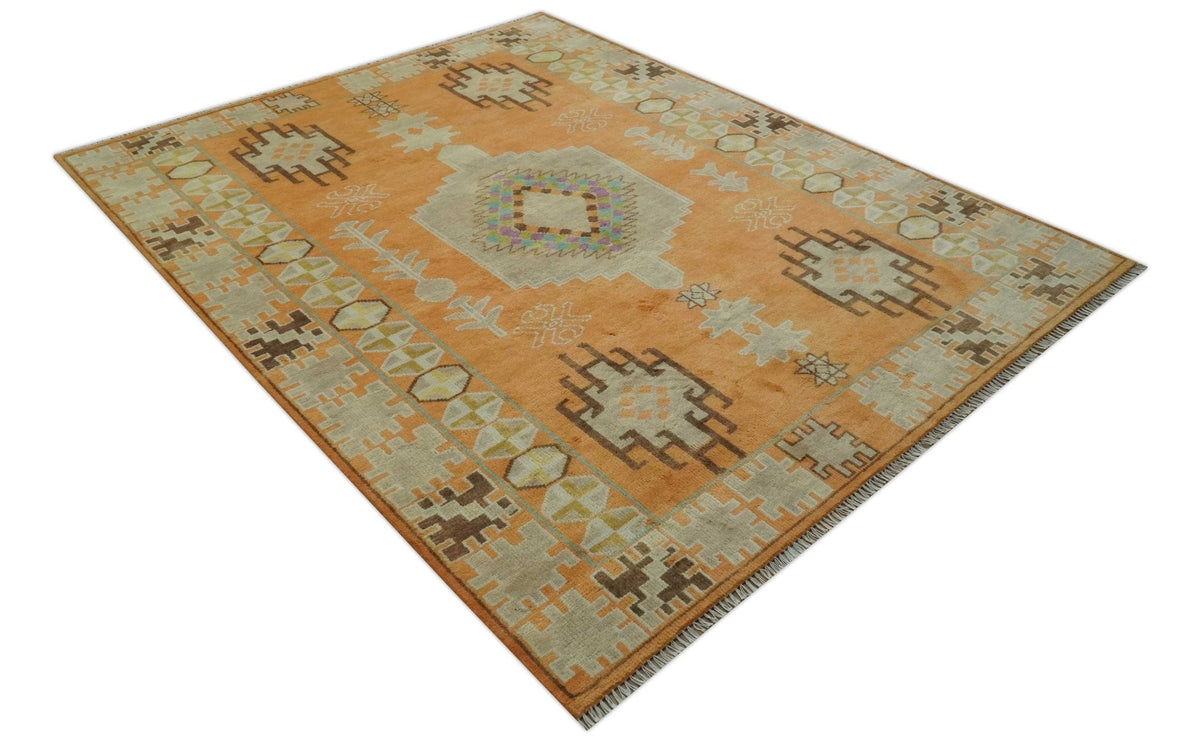 Hand Knotted Peach and Beige Traditional Southwestern Multi Size wool area rug.
