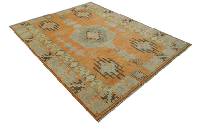 Hand Knotted Peach and Beige Traditional Southwestern Multi Size wool area rug.