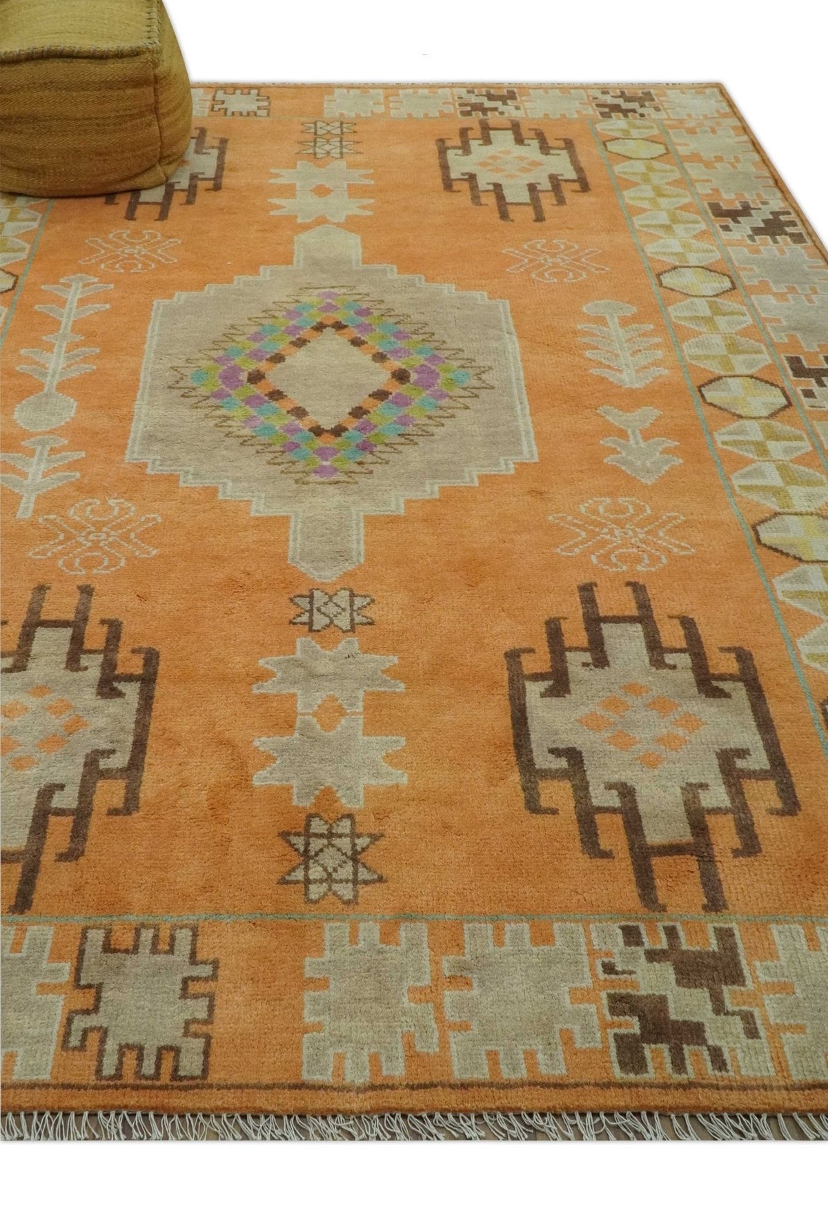Hand Knotted Peach and Beige Traditional Southwestern Multi Size wool area rug.