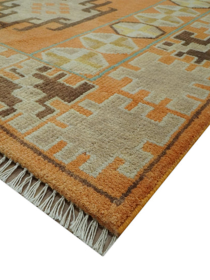 Hand Knotted Peach and Beige Traditional Southwestern Multi Size wool area rug.