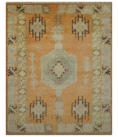 Hand Knotted Peach and Beige Traditional Southwestern Multi Size wool area rug.