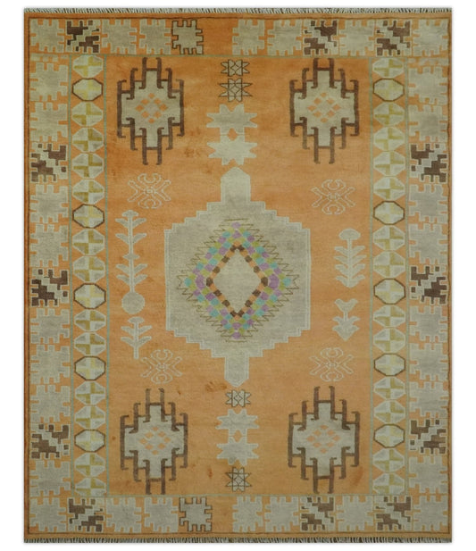 Hand Knotted Peach and Beige Traditional Southwestern Multi Size wool area rug.