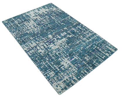 Hand Knotted Teal and Ivory Modern Abstract Contemporary Recycled Silk Area Rug.