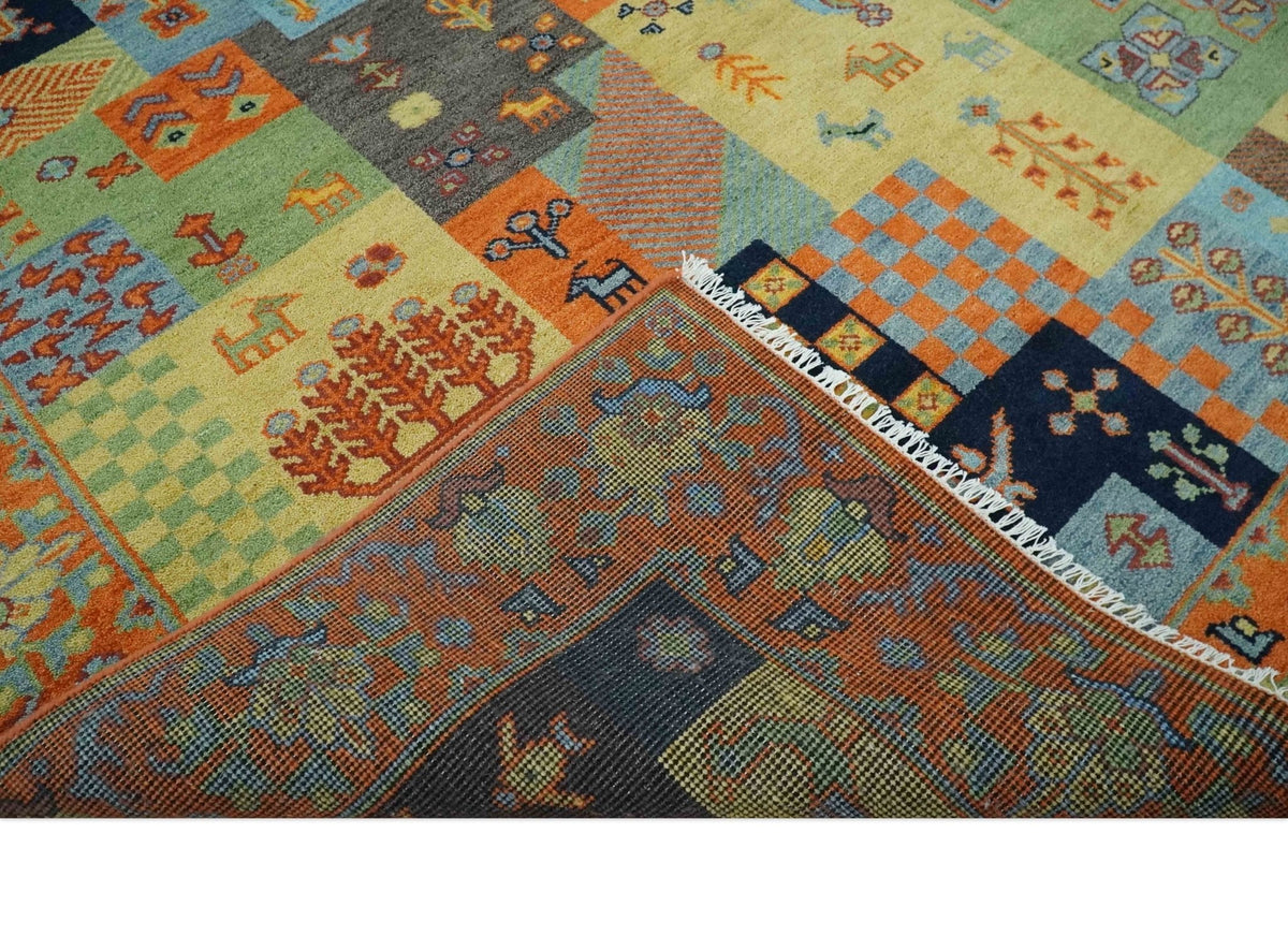 Hand knotted Traditional Antique Tribal Style Gabbeh Design Wool Area Rug.