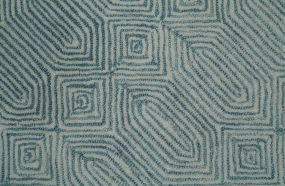 Modern Contemporary Style Teal and Ivory Hand Tufted Wool Area Rug.