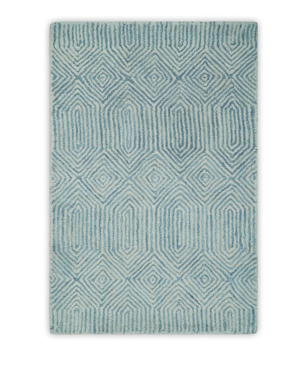 Modern Contemporary Style Teal and Ivory Hand Tufted Wool Area Rug.