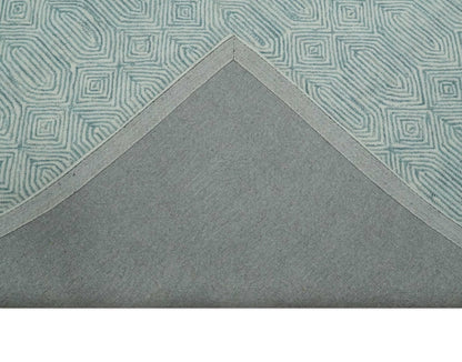 Modern Contemporary Style Teal and Ivory Hand Tufted Wool Area Rug.