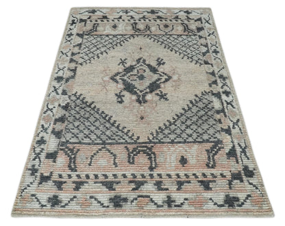 Hand Woven Peach and Charcoal Blended Hand Knotted Wool Rug.