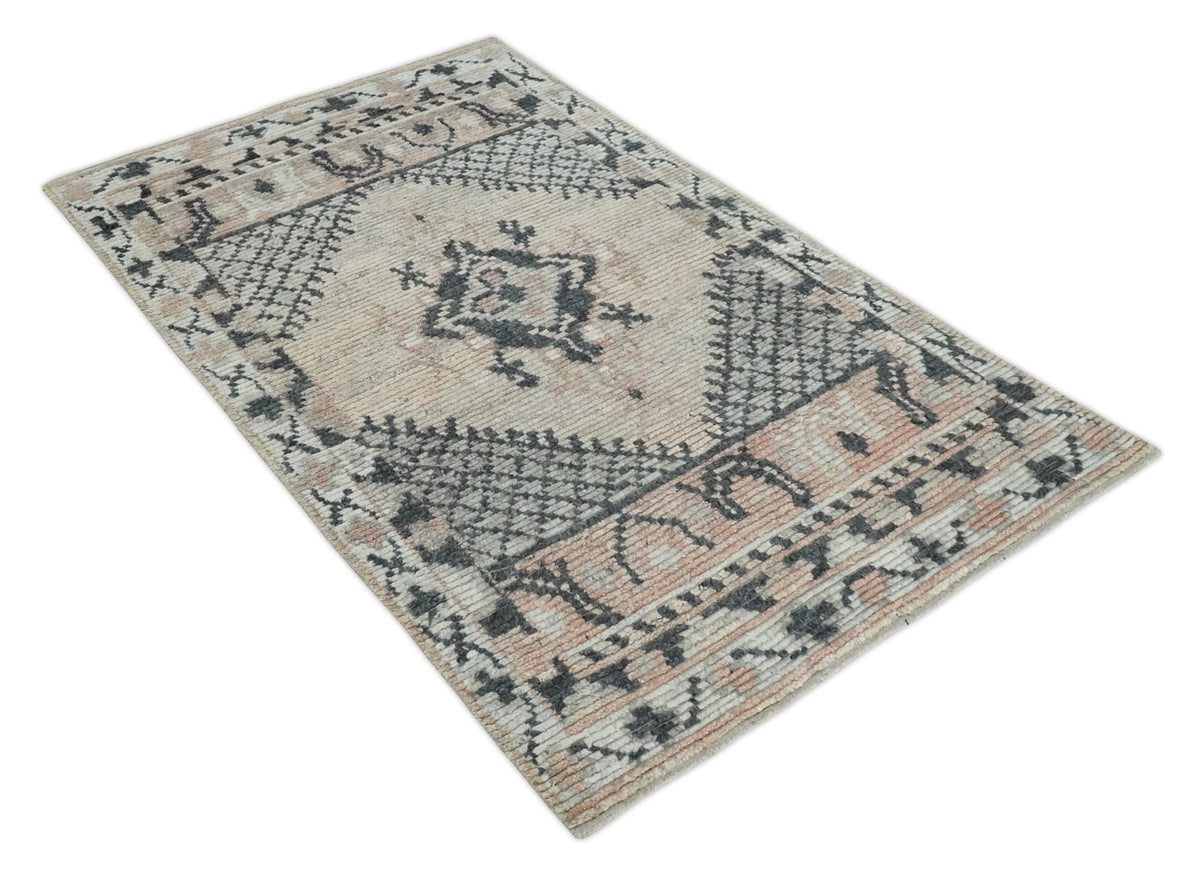 Hand Woven Peach and Charcoal Blended Hand Knotted Wool Rug.