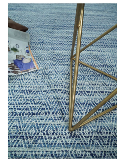 Handmade Boho Ivory and Blue Wool Blend Dhurrie Rug.