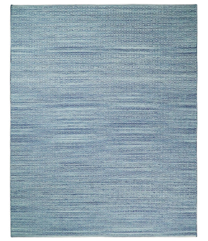 Handmade Boho Ivory and Blue Wool Blend Dhurrie Rug.
