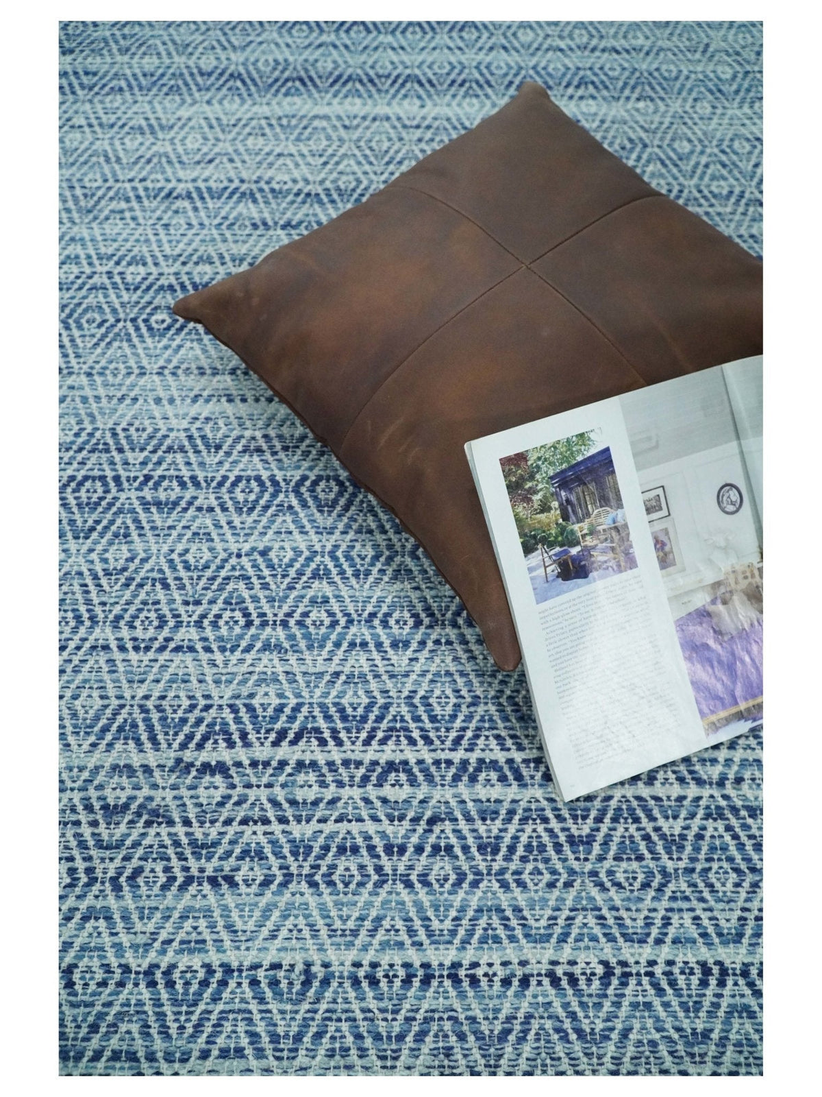 Handmade Boho Ivory and Blue Wool Blend Dhurrie Rug.