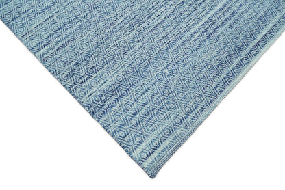 Handmade Boho Ivory and Blue Wool Blend Dhurrie Rug.