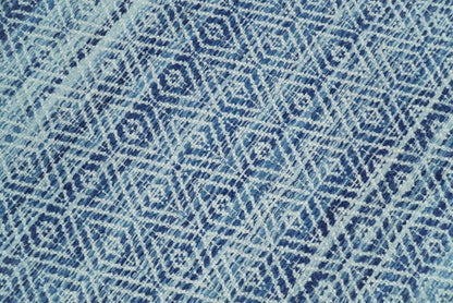 Handmade Boho Ivory and Blue Wool Blend Dhurrie Rug.