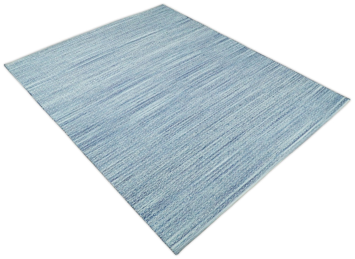 Handmade Boho Ivory and Blue Wool Blend Dhurrie Rug.