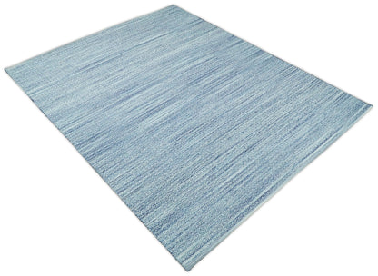 Handmade Boho Ivory and Blue Wool Blend Dhurrie Rug.