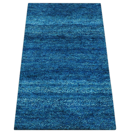 High Pile Blue Hand knotted Contemporary Custom Made Solid Afghan wool Area Rug.