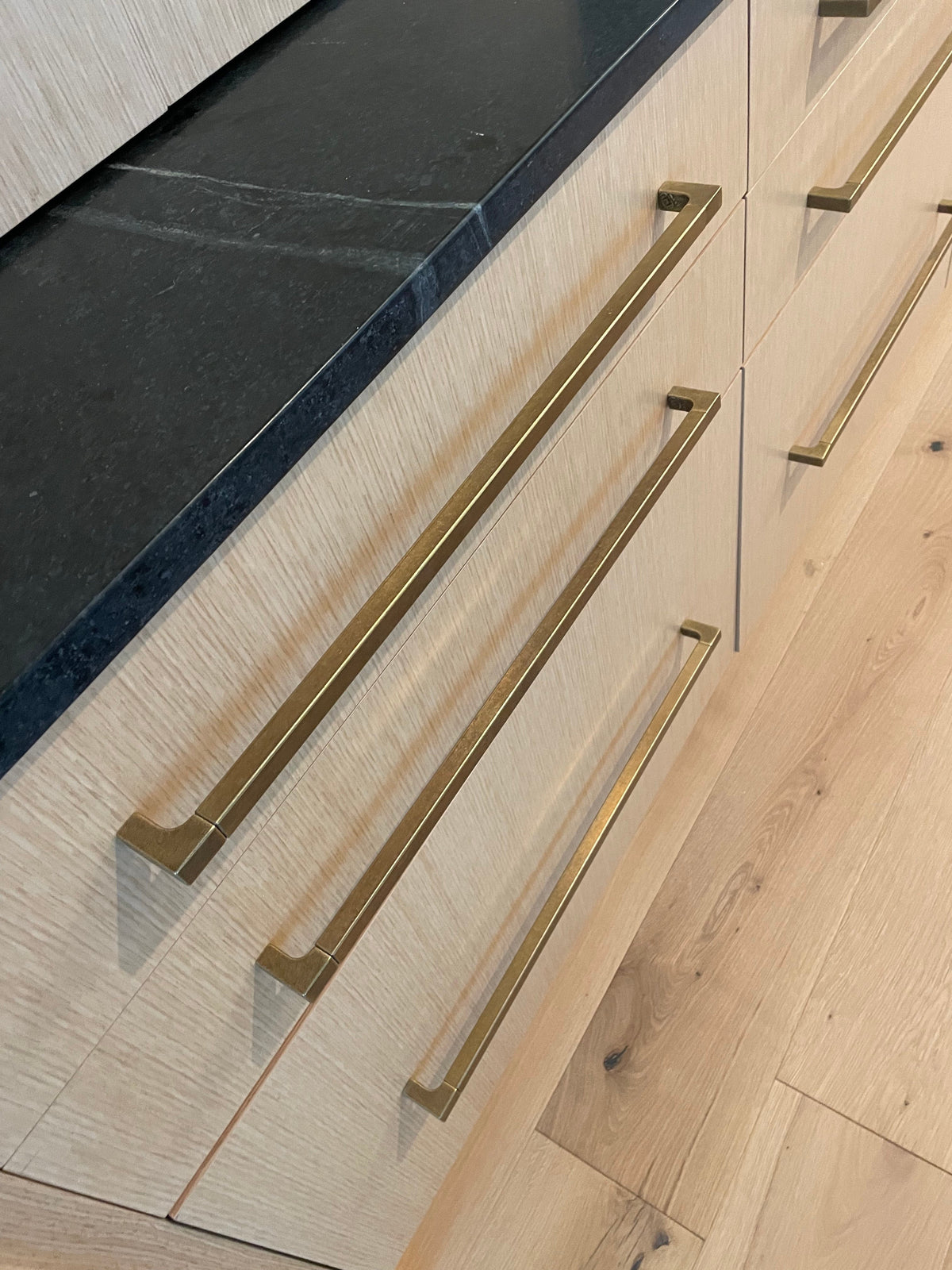 Lora Aged Brass Drawer and Appliance Pulls.