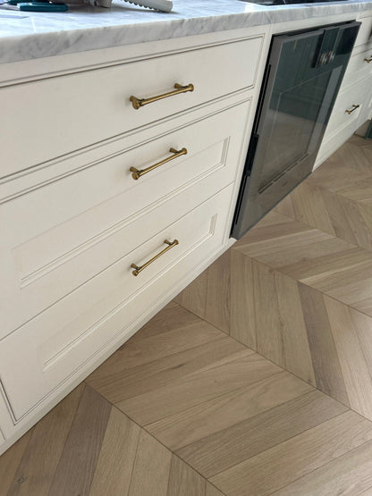 Hourglass "Tuscany" Drawer Pulls and Knobs in Antique Brass.
