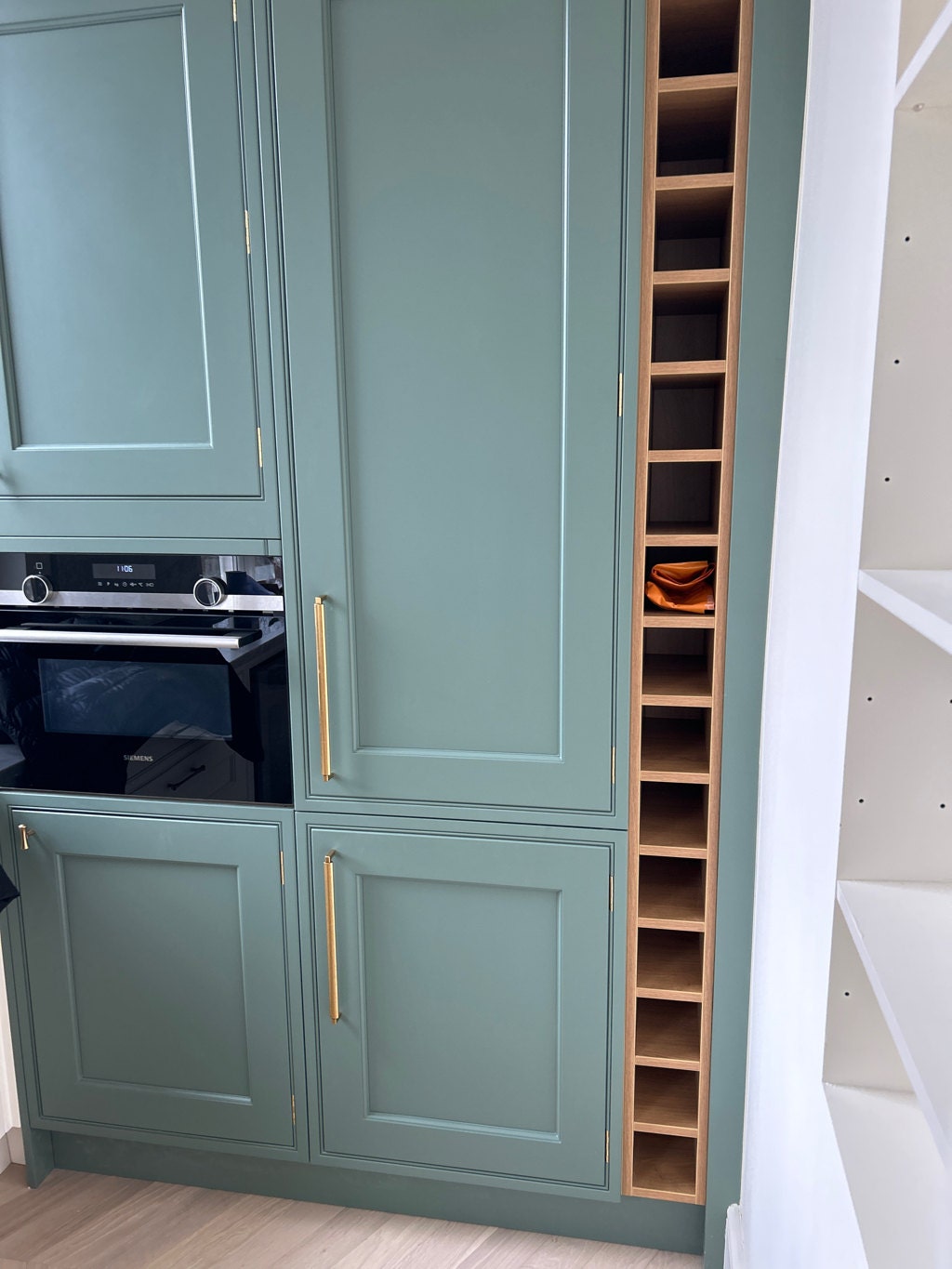 U-Shaped "Florence" Cabinet Knob and Drawer Pulls in Antique Brass.