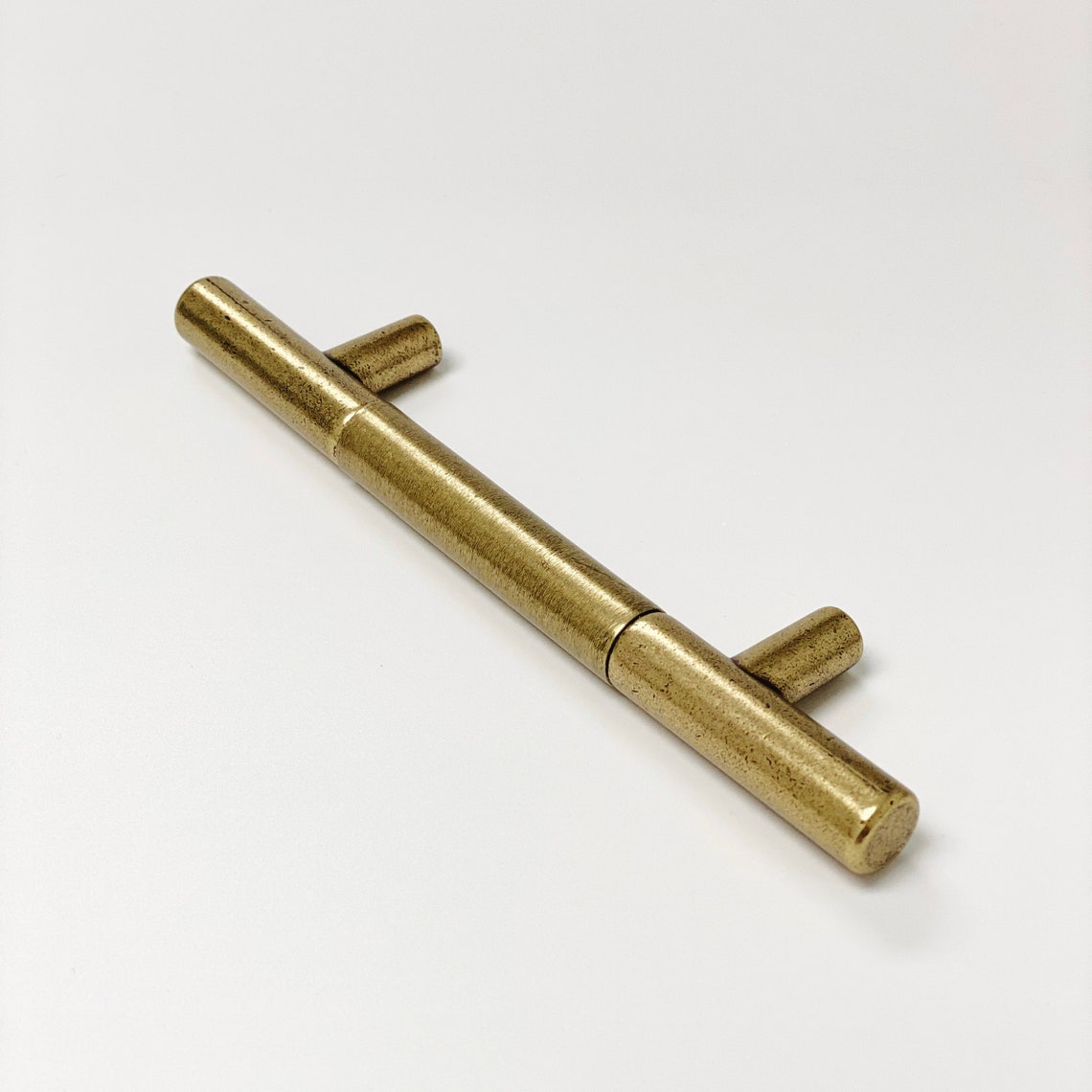 Sydney Aged Brass Cabinet Knob and Drawer Pulls.