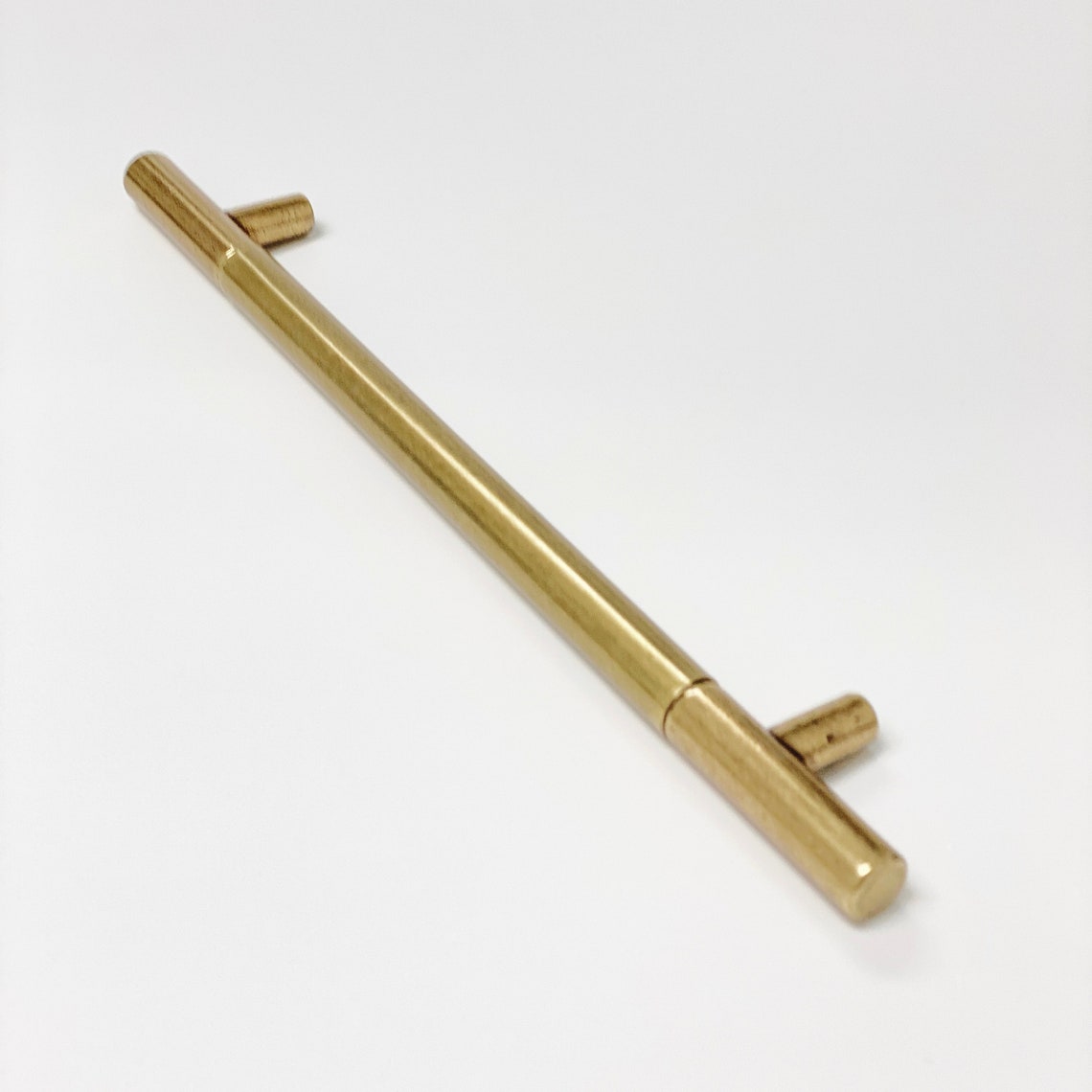 Sydney Aged Brass Cabinet Knob and Drawer Pulls.
