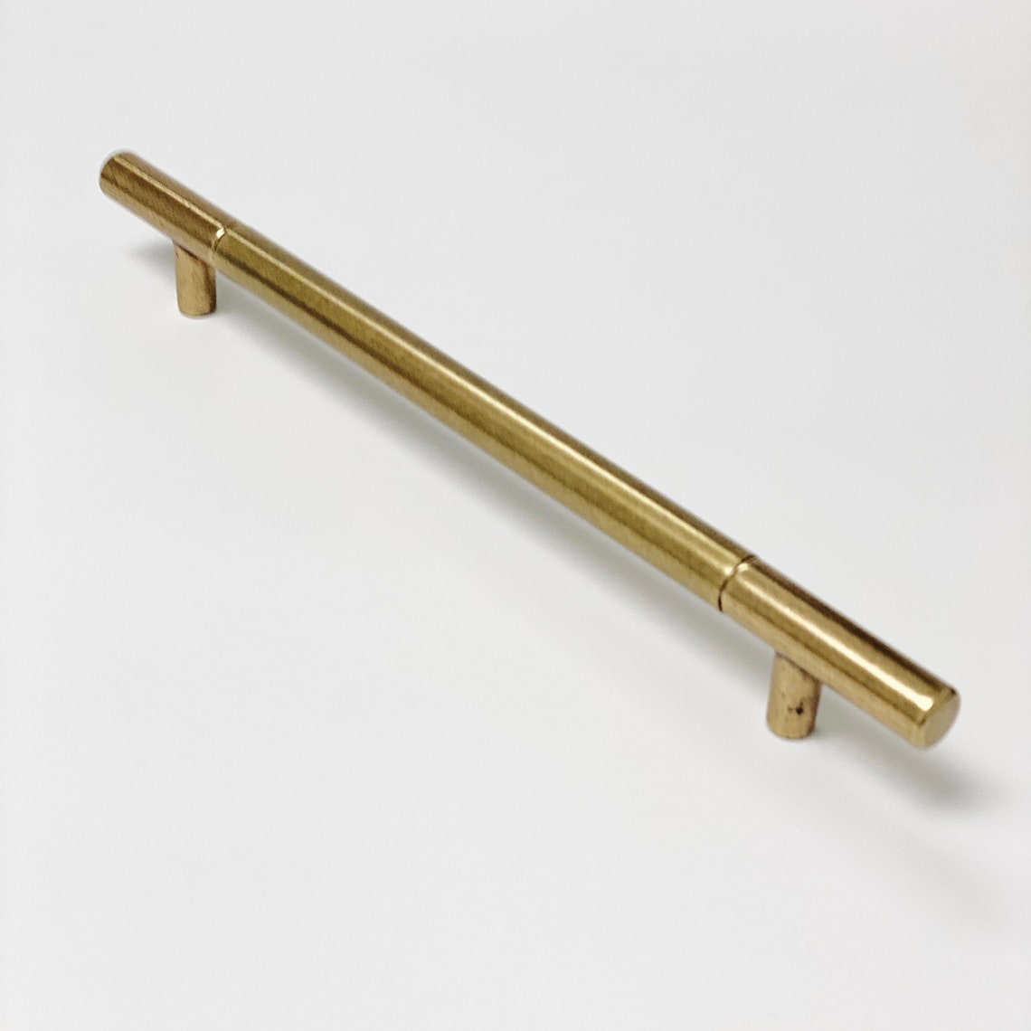Sydney Aged Brass Cabinet Knob and Drawer Pulls.