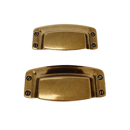Drawer Cup Pull "Tuscany" in Antique Brass.