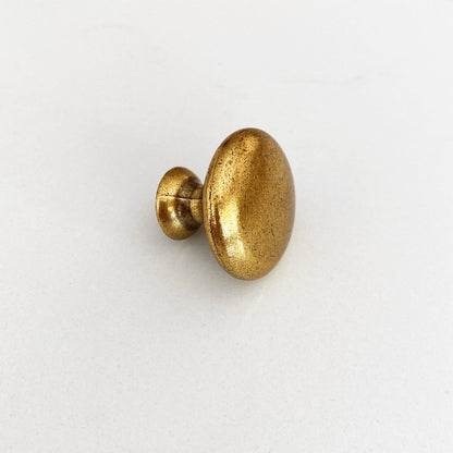 Round "Capri" Antique Brass Cabinet Knob.