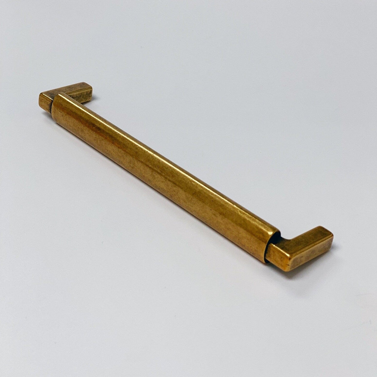 U-Shaped "Florence" Cabinet Knob and Drawer Pulls in Antique Brass.