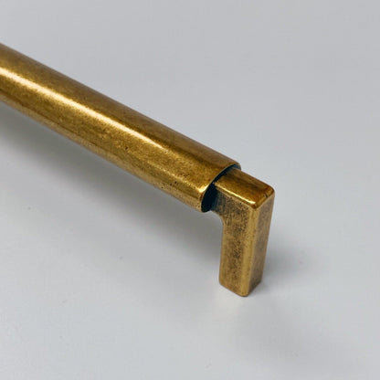 U-Shaped "Florence" Cabinet Knob and Drawer Pulls in Antique Brass.
