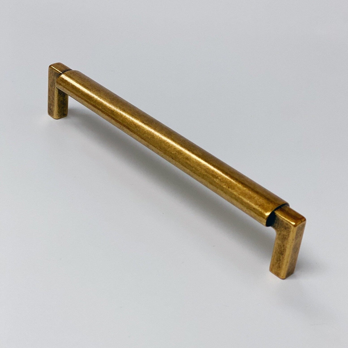 U-Shaped "Florence" Cabinet Knob and Drawer Pulls in Antique Brass.