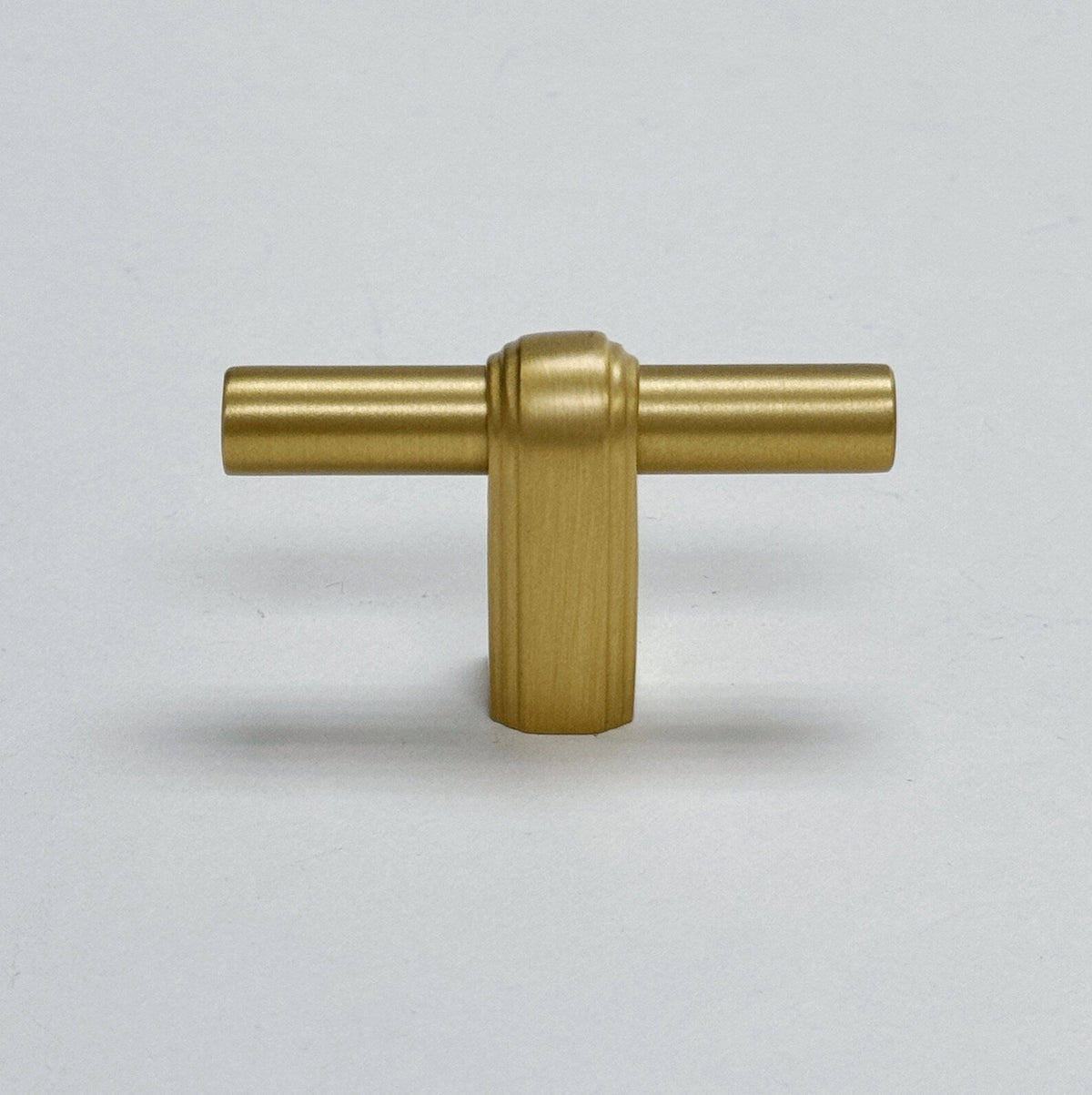 Satin Brass "Elliott" Drawer Pulls and Cabinet Knobs.