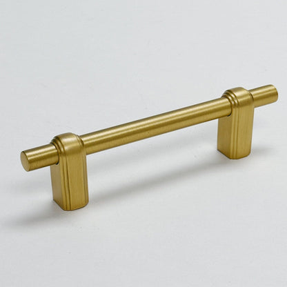 Satin Brass "Elliott" Drawer Pulls and Cabinet Knobs.