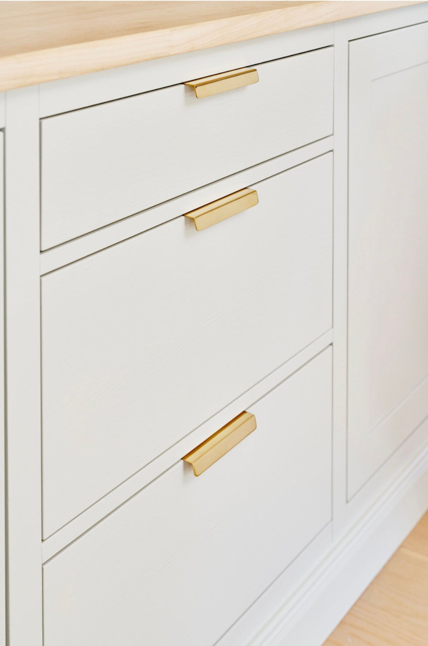Unlacquered Brass "Patina" Edge Drawer Pulls.