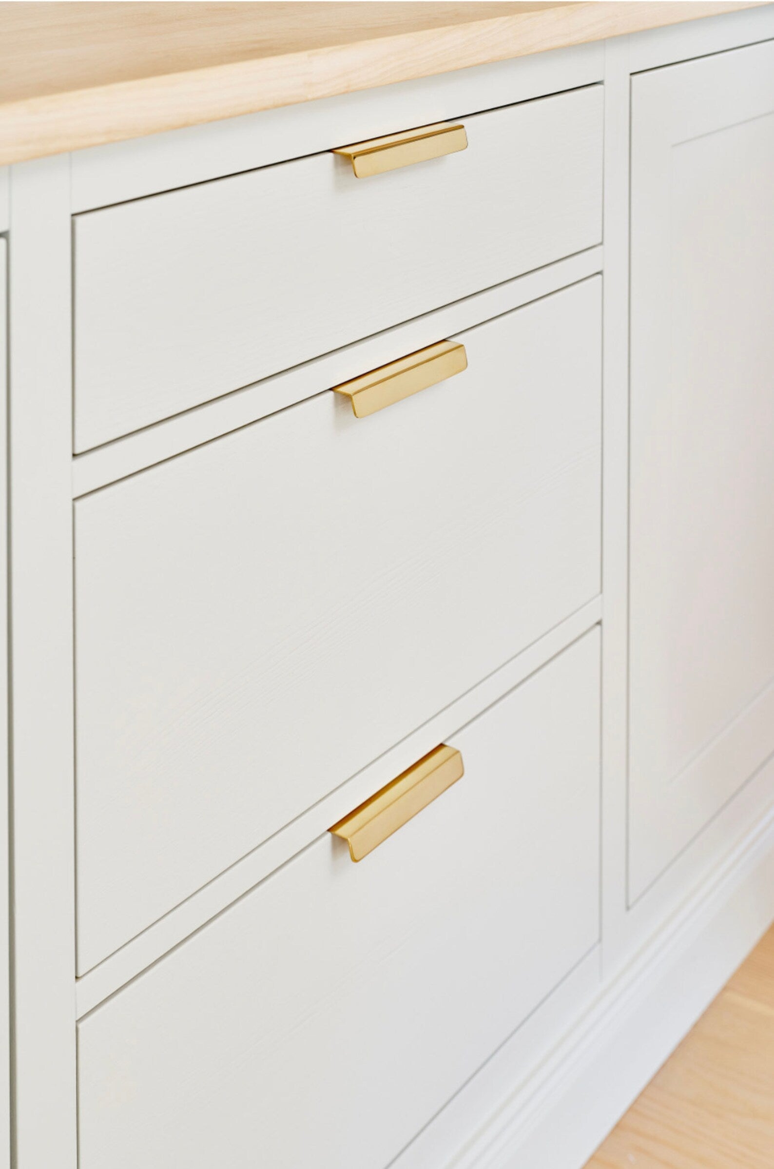 Unlacquered Brass "Patina" Edge Drawer Pulls.