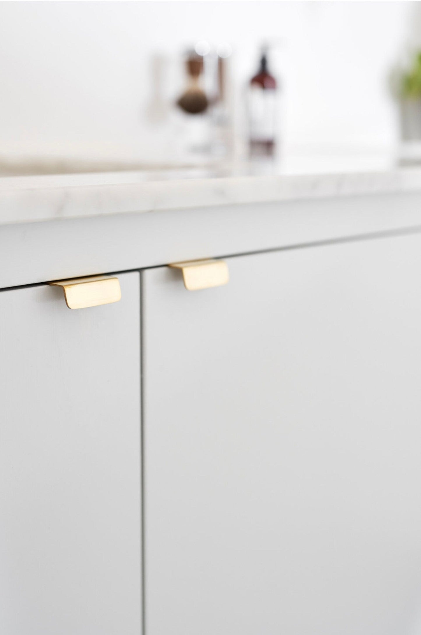 Unlacquered Brass "Patina" Edge Drawer Pulls.