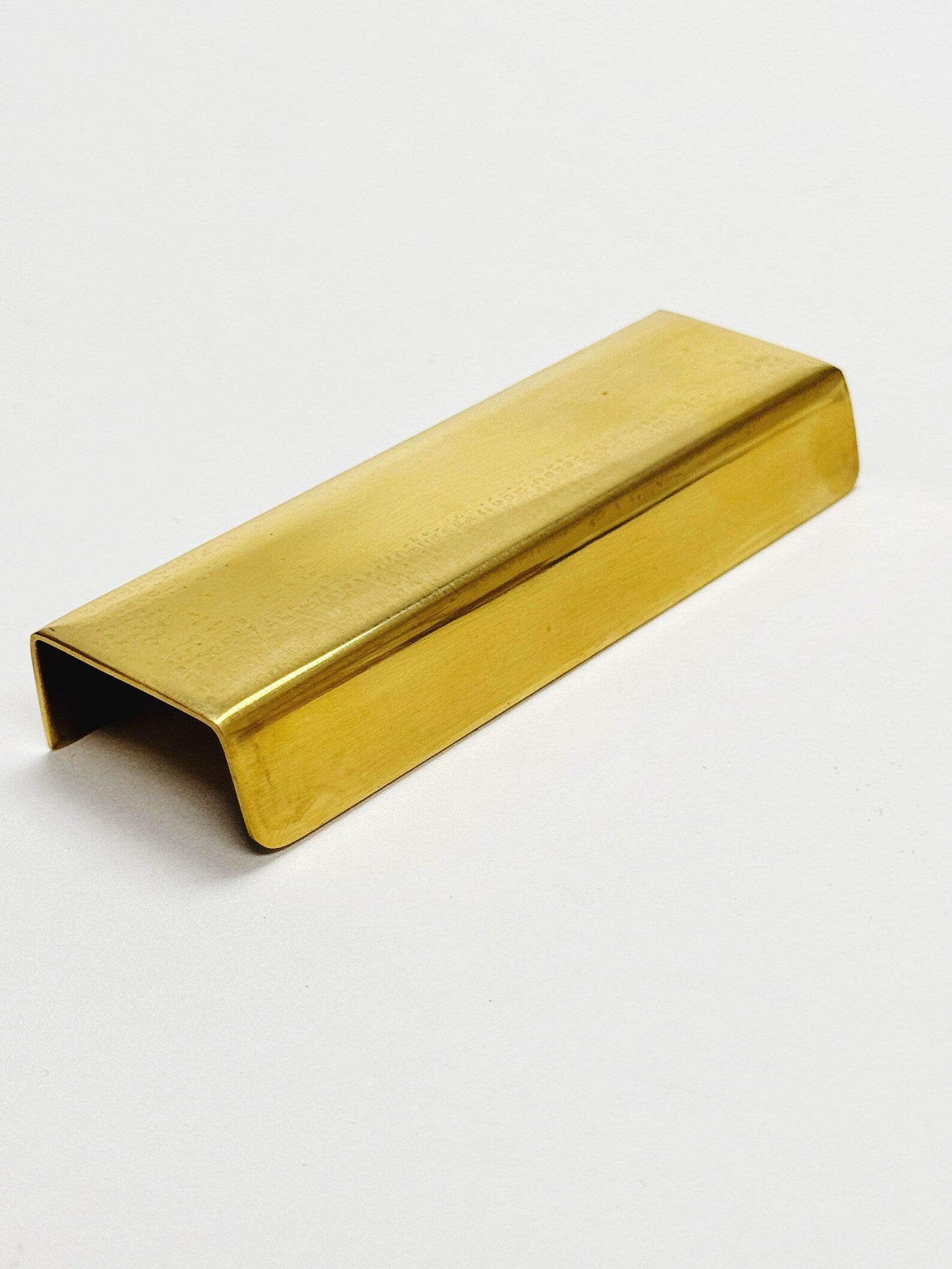Unlacquered Brass "Patina" Edge Drawer Pulls.