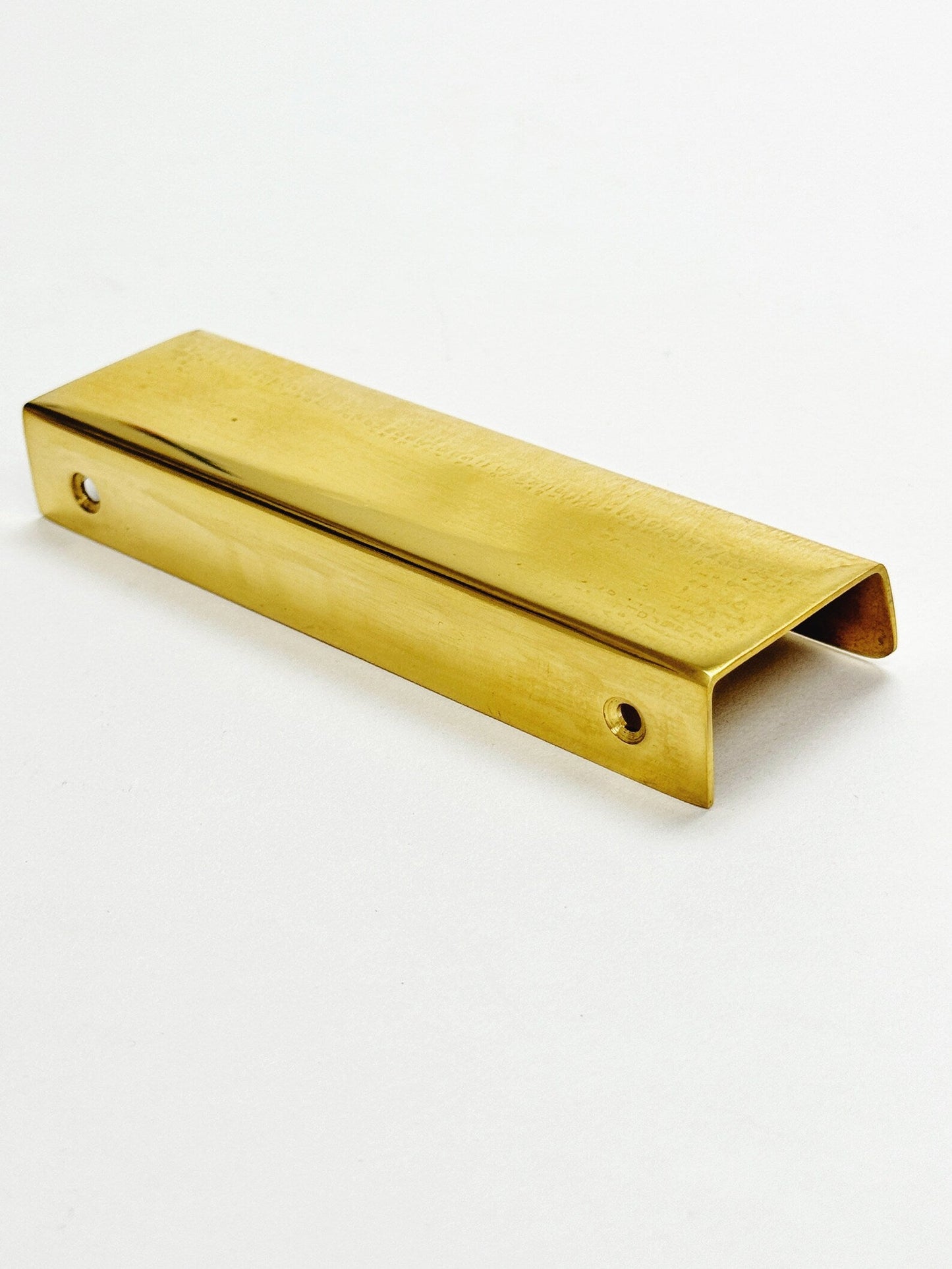 Unlacquered Brass "Patina" Edge Drawer Pulls.