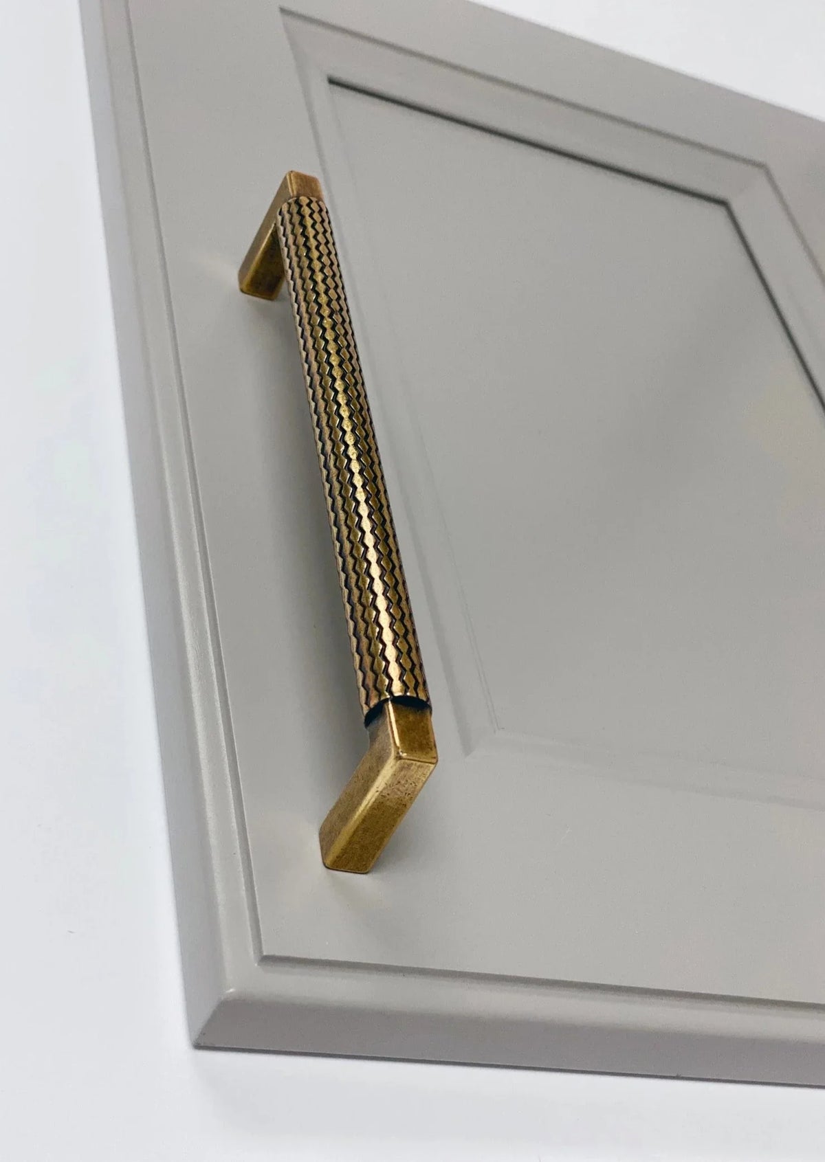 U-Shaped Antique Brass "Venice" Cabinet Knob and Drawer Pulls.