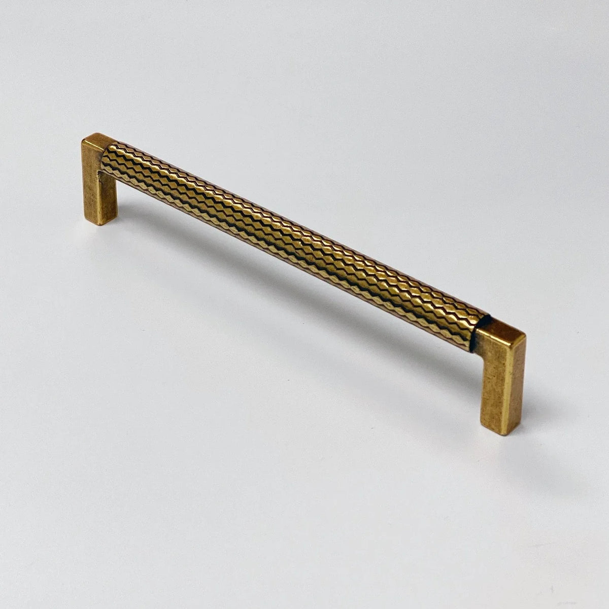 U-Shaped Antique Brass "Venice" Cabinet Knob and Drawer Pulls.