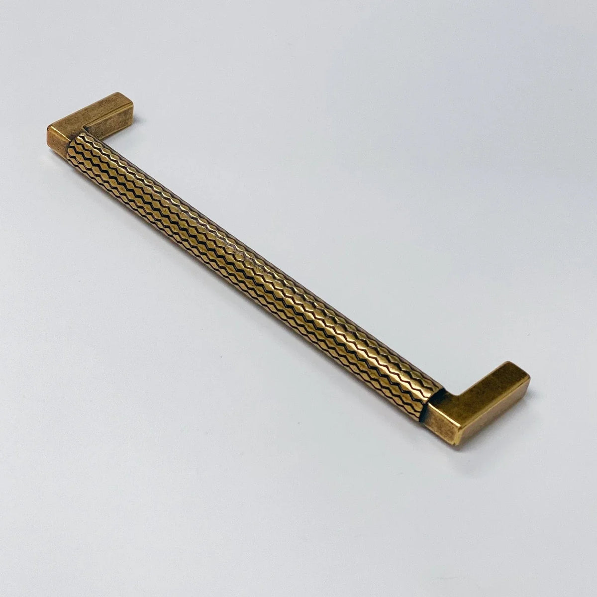 U-Shaped Antique Brass "Venice" Cabinet Knob and Drawer Pulls.