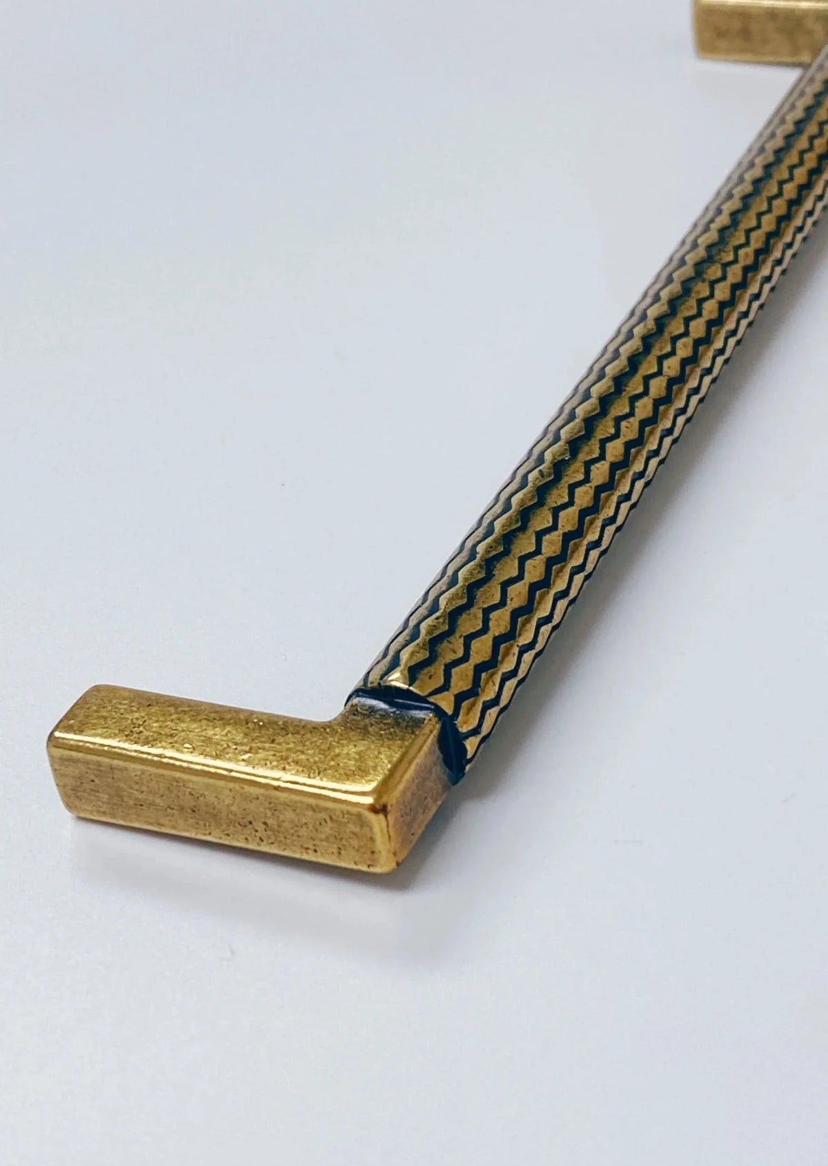 U-Shaped Antique Brass "Venice" Cabinet Knob and Drawer Pulls.