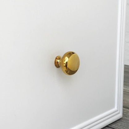 Unlacquered Brass "Eloise" Round Cabinet Knob.