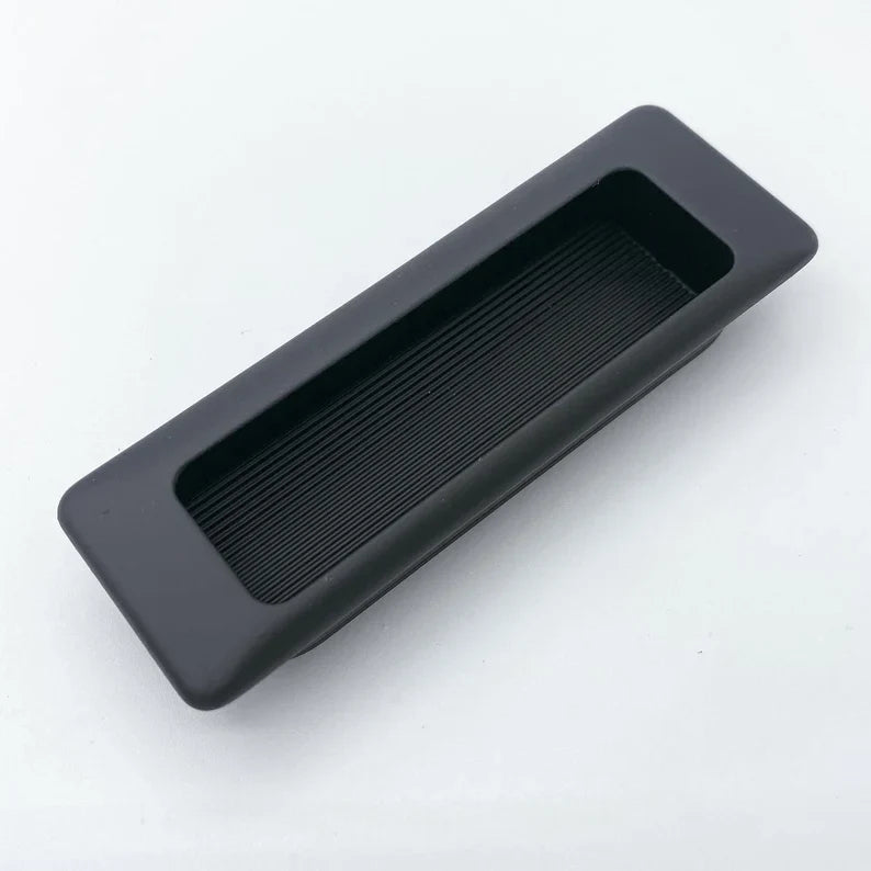 Recessed Matte Black Drawer Pulls.